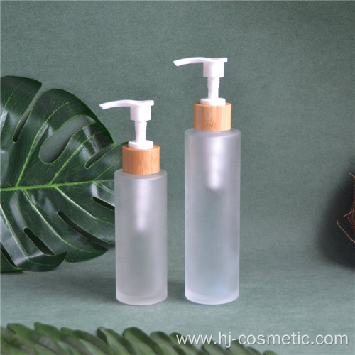 wholesale Frost 150ml 100ml glass bottle with bamboo wooden lotion sprayer pump Customized Made Cosmetic packaging